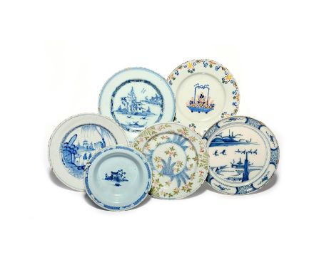 Six delftware plates or dishes  c.1710-60, one Bristol and inscribed 'S W A' to the other side, a small Lambeth dish painted 