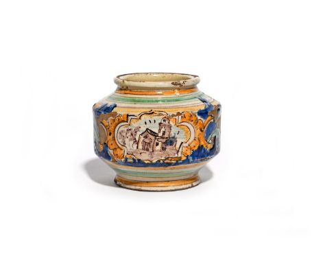 A small Caltagirone maiolica albarello  late 17th century, the squat cylindrical sides painted with buildings within a shaped