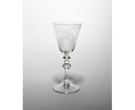 A Dutch-engraved light baluster goblet  c.1765, the generous rounded funnel bowl engraved with two ships at sail, flying long