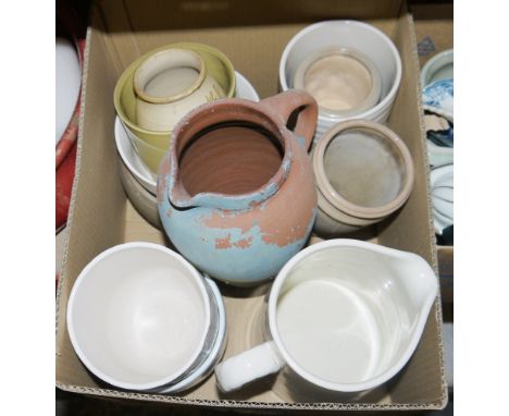 Assorted ceramics including various water jugs, flower vases, a large turned wooden candlestick, two mid-century models of ce