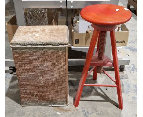 Adjustable red painted wooden bar stool and a Lloyd Loom style laundry bin