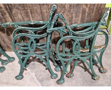 Pair of Victorian/early 20th century green-painted scroll-shaped bench ends, a pair of matching early 20th century aluminium 