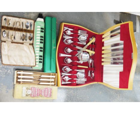 Hohner soprano Melodica&nbsp;in original case, a cased set of stainless steel table knives, a cased spoon and tong EPNS set a