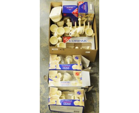 Quantity of Lurpak cream glazed ceramics, a Poole pottery dolphin figural group, five Royal Worcester ramekins&nbsp;and other