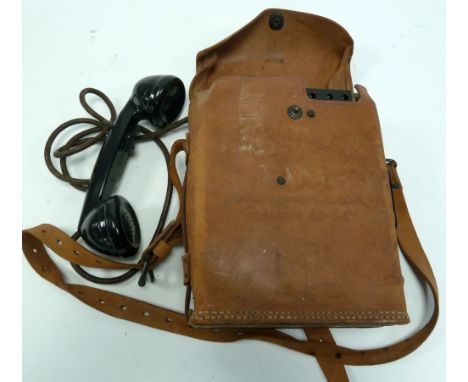 A SECOND WORLD WAR UNITED STATES ARMY SIGNAL CORPS TELEPHONE EE-8-B in leather case with shoulder strap 
