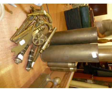 A PAIR OF INDIAN GURKHA KUKRIS, LARGE BRASS SHELL CASE VASE AND TWO PAIRS SMALLER DITTO, A BRASS MODEL CANNON, THREE FLINTLOC