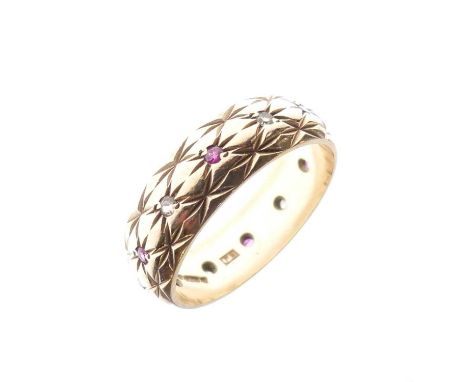 9ct gold wedding band with engraved decoration and alternate set rubies and white stones, size M½ approx, 3.7g gross approx