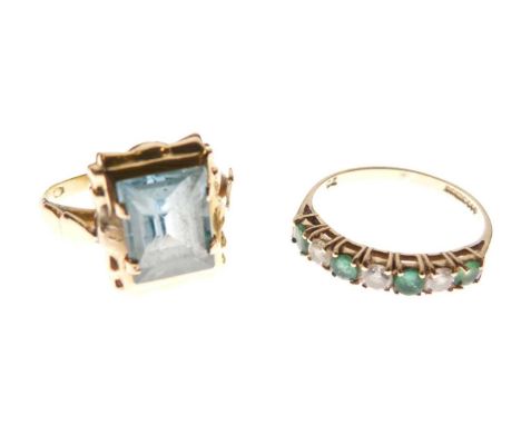 Two dress rings, one set rectangular green stone, the shank stamped '750', size L approx, and a 9ct gold eternity ring set cu