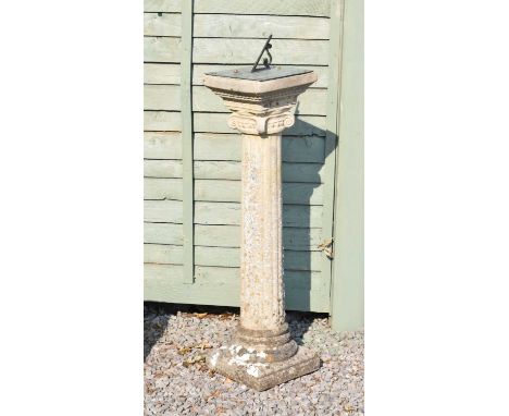 Composite stone sundial marked 'Redime', on reeded column, 21cm x 86cm high 