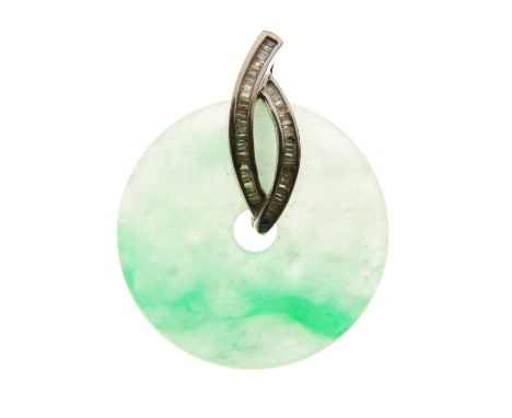 Diamond and jade pendant, stamped '750 18K', and 'D0.23ct', the jade disc approximately 2.5cm diameter, with a mount of chann
