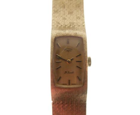 Rotary - Lady's 14K dress watch, rectangular champagne dial with applied gilt hour markers and gilt hour and minute hands, 21