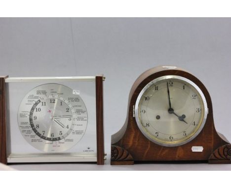 A Japanese 'Lord King' World Clock and an Oak Cased Mantle Clock