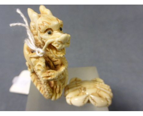 A Carved Ivory Dragon, signed, and a Single Crab Netsuke, signed 