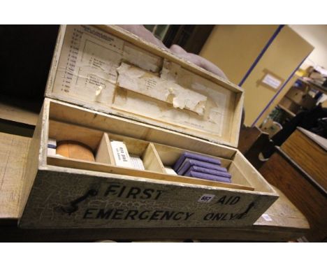 A Vintage First Aid Box with contents 