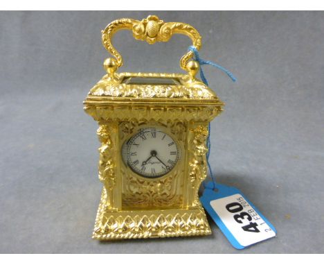A Miniature Carriage Clock in the Rococco style 