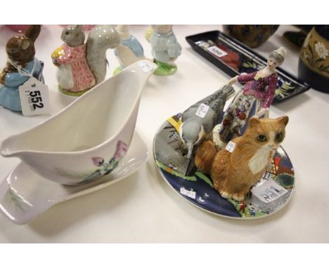 A Royal Doulton Ginger Cat, Carltonware Sauce Boat and Stand, Poole Plate, Royal Worcester Nuthatch and a Continental Figure