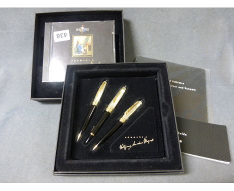 A Mont Blanc Presentation Set of Three Pens 'Hommage A Wolfgang Amadeau Mozart' with service guide, polishing cloth and CD 