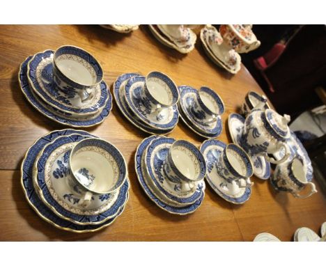 A Booths 'Real Old Willow' Tea Set comprising Teapot, Sugar, Milk Jug, Sandwich Plate, Six Tea Plates, Five Saucers, Six Tea 