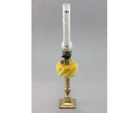 A Small Late 19th century Brass Oil Lamp with yellow glass well 