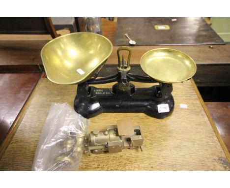 A Pair of Cast Iron Libra Scales with Brass Pans plus Five Brass Weights and Brass Train 