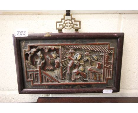 An Oriental School Carved Panel Portrait of Figures in a Scenic View 