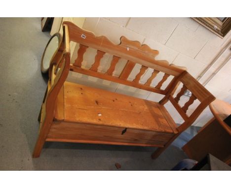 A Pine Bench / Settle with carved back and arms 