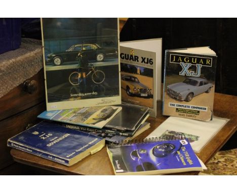 A Collection of Vintage Car Manuals, Sales Brochures, Framed Jaguar Advert and other books including Jaguar, TVR,Opal and Mon