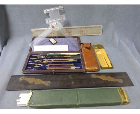 A Group of Vintage Rules including a leather cased 'JH Steward of London' folding Boxwood Rule, Projector and Spirit Level pl