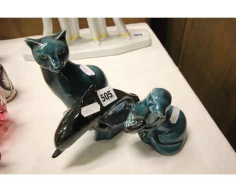 A Poole Pottery Blue Glazed Cat, Otter and Dolphin 