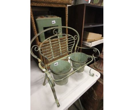 A Wrought Iron Double Plant Pot Holder in the form of a Bench 