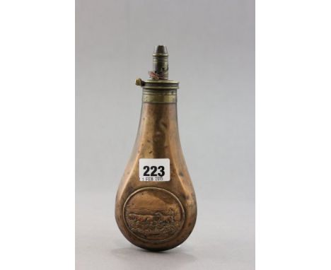 A 19th century Copper and Brass Powder Flask with Hunting Dog Relief Panel 