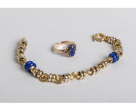 2-teiliges Schmuckset, bestehend aus: 1x Ring 333 GG, besetzt m. 1 Lapislazuli-Cabochon,gestempelt: Feingehalt, Ringgröße: 61