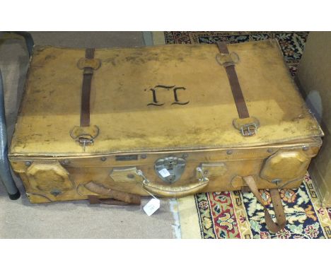A vintage leather suitcase by Nam Ha Leather Factory, Hong Kong, Shanghai, 76 x 42cm, 20cm high.