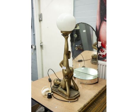 ART DECO STYLE GILT COMPOSITION TABLE LAMP OF A NUDE GIRL ACROBAT AND A WHITE ORBICULAR SHADE, 27" HIGH AND A FRAMELESS FANCY