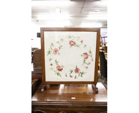 A CHEVAL FIRESCREEN/OCCASIONAL TABLE WITH NEEDLEWORK PANEL