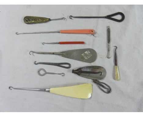 A collection of approximately 12 assorted Button  and Boot Hooks.