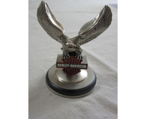 A Harley Davidson Paperweight, formed as an eagle  perched atop the Harley logo, height approx 9cm.