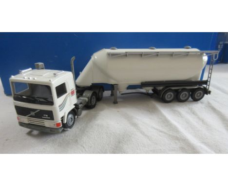A good quality West German (Conrad, for Volvo)  1:50 die-cast Model of a Volvo F12 tractor unit  and bulk tanker Trailer, mod