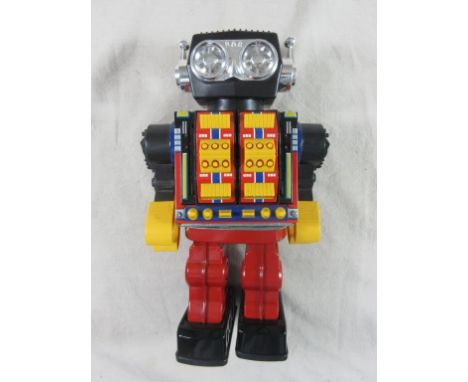 A Japanese late 20th Century battery-operated  tinplate Robot, approx height 30cm.