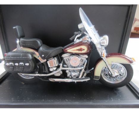 A highly detailed die-cast 1:10 model of a Harley  Davidson 'Heritage Softail Classic', by Frankin  Mint, in display case, mo