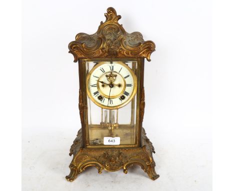 A Victorian gilt-brass 4-glass 8-day mantel clock, with enamelled dial and Roman numerals, striking on a gong, with mercury p