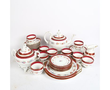 Extensive floral decorated porcelain tea service, including teapot and sucrier 