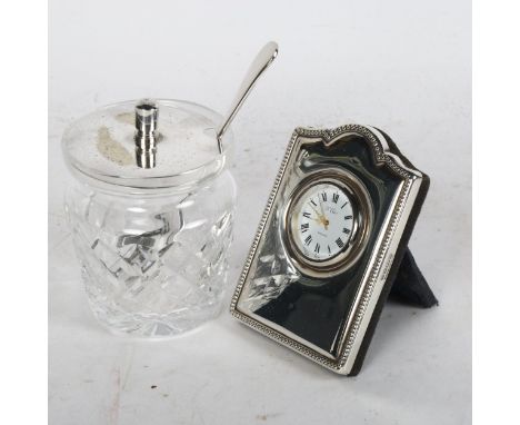 R Carr small silver-fronted clock and a preserve jar and cover, plated lid 