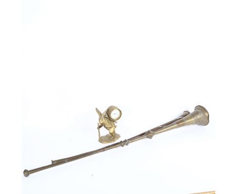 A Vintage brass rabbit clock, 18cm, an Eastern brass horn, and a copper horn 