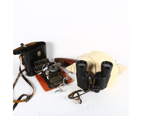 A seashell lamp, an oversized corkscrew, miniature typewriter, and binoculars in case 