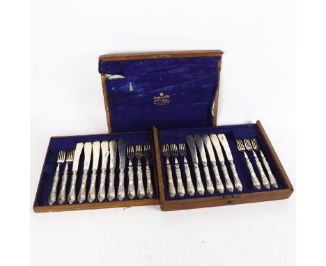 An early 20th century Mappin & Webb silver plated fish service for 12 people, with engraved handles, lacking 1 knife and fork
