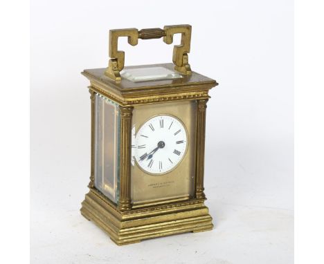 JOSEPH GK & CAIRMS - a brass-cased 8-day carriage clock, with bevelled-glass panels and reeded columns, height not including 