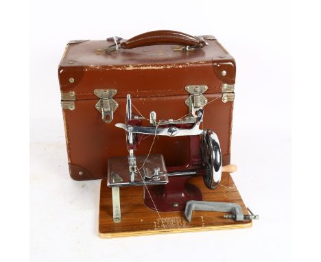 Essex miniature sewing machine, 1950s, with original guarantee and instruction manual, in carry case 