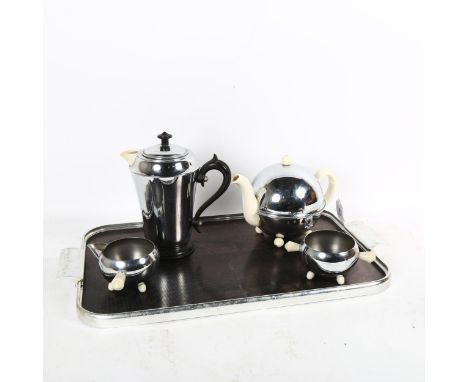 Chrome and ceramic heater saver 1950s tea set, to include tray 