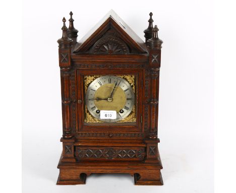 A German mantel clock with 2-train movement and carved oak case, 39cm 